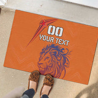 Orange rubber doormat with lion graphic and "GO YOUR TEXT"