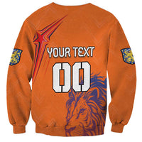 Orange crewneck sweatshirt with lion graphic and YOUR TEXT/00 print, long sleeves