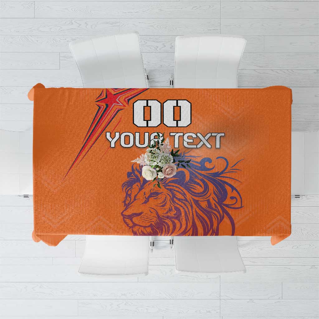 Orange printed football tablecloth with lion graphic and bold text design