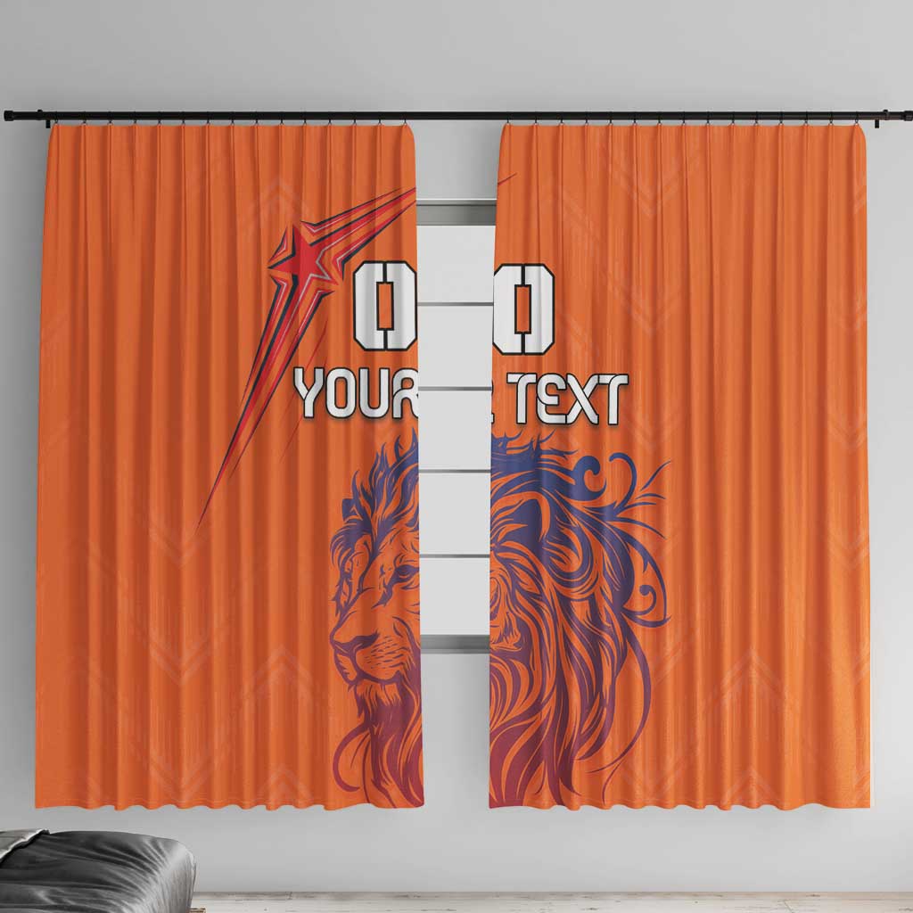 Orange window curtains with blue lion print on center panels; custom text styling
