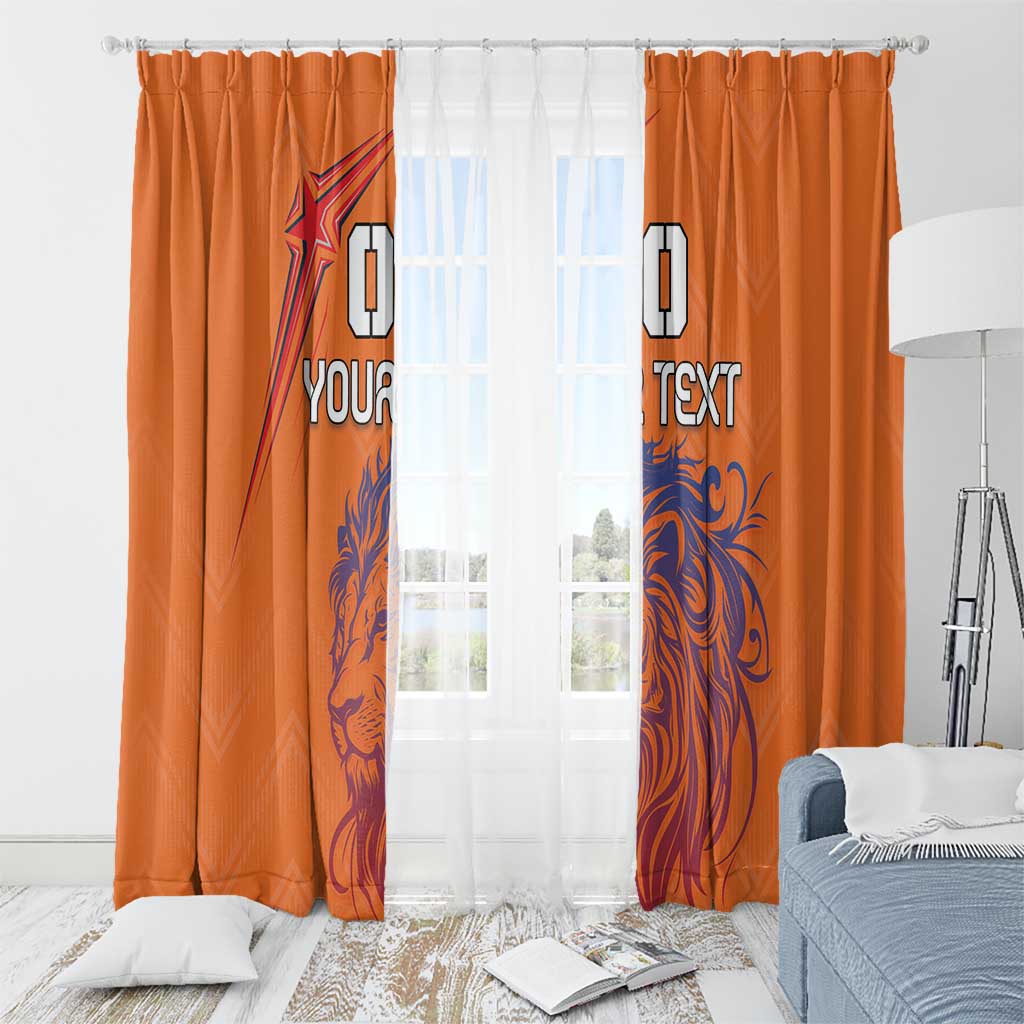 Orange window curtains with blue lion graphic and custom text, pleated with hooks