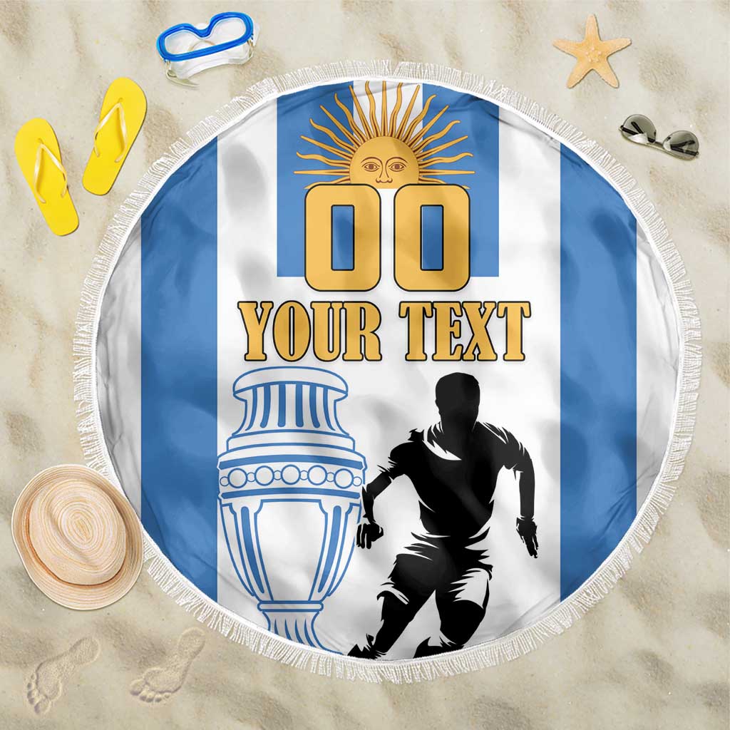 Round beach blanket with blue-and-white Argentina player graphic and fringed edge