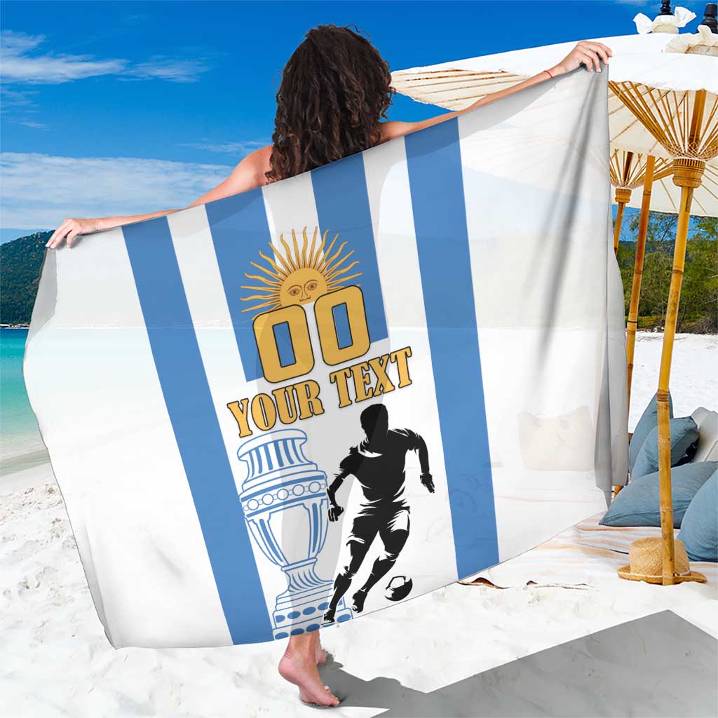 White Argentina football sarong with blue vertical stripes and golden emblem graphic