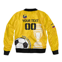 Yellow unisex football bomber jacket, back shows trophy, soccer ball and custom text 01