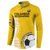 Yellow button sweatshirt with Colombia Go Champions logo, trophy, and Los Cafeteros soccer graphic