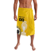 Yellow football-style shorts with elastic waistband and large front graphic