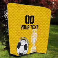 Yellow football quilt, diamond quilting, soccer ball and trophy graphic, black border