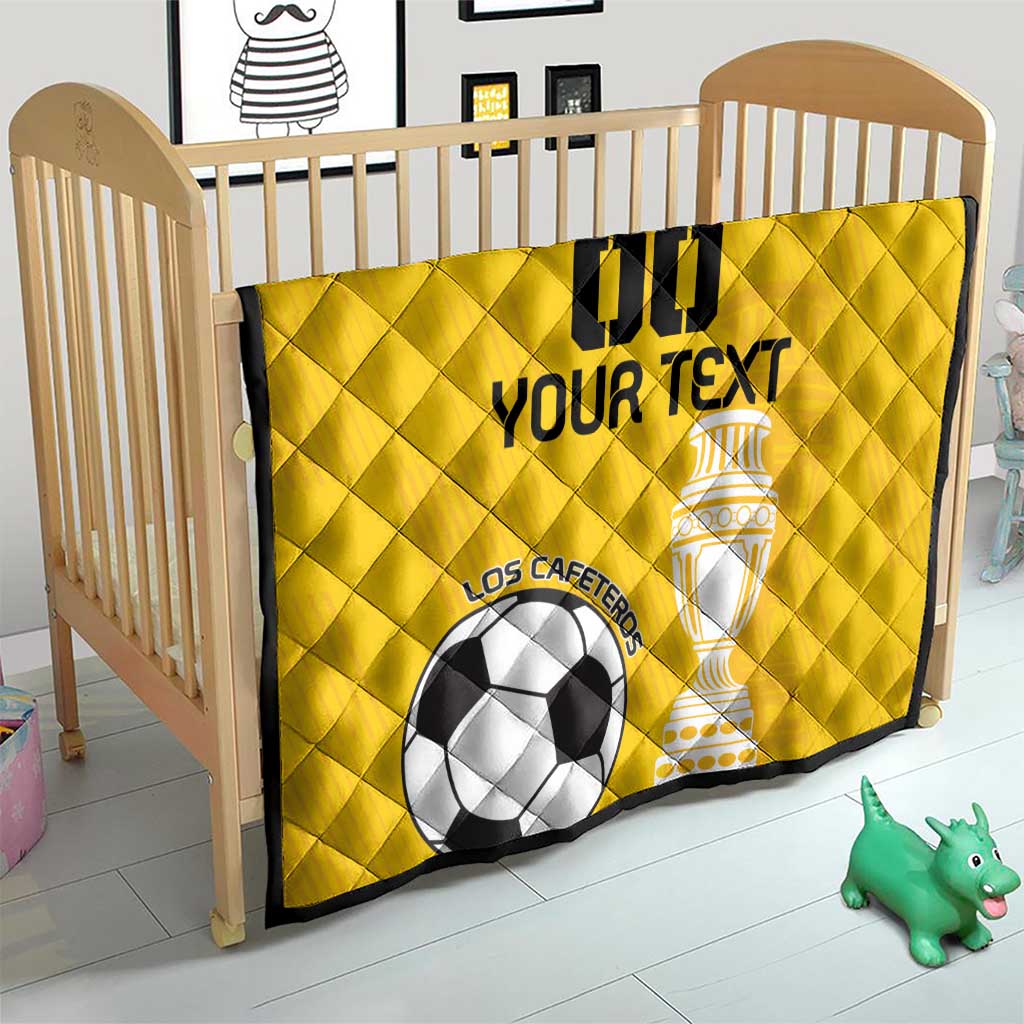 Yellow football quilt on baby bed, diamond quilting, soccer ball and trophy graphic