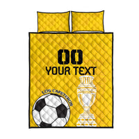 Yellow football quilt bed set, front view with two pillowcases and full team print
