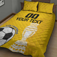 Yellow football quilt bed set with two pillowcases, quilted texture and large logo