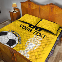 Yellow football quilt bed set with two pillowcases, bold black text and trophy graphic