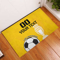 Yellow custom rubber football doormat with trophy and soccer ball “Los Cafeteros” design.