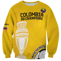 Yellow football sweatshirt with Colombia Go Champions logo and large trophy graphic