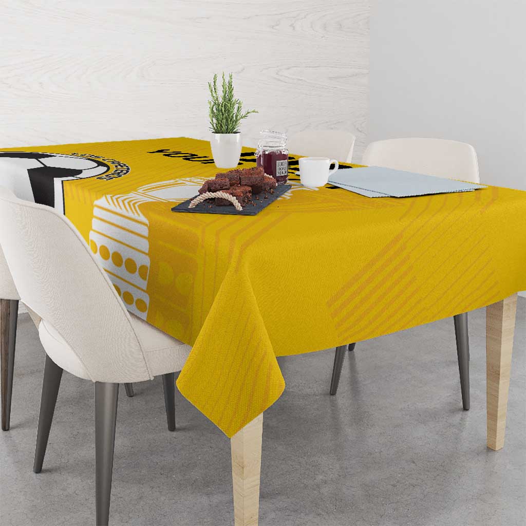 Yellow football tablecloth with soccer ball and black trophy graphic