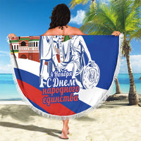 Blue circular beach blanket with fringed edge, large Minin figure and monument scene