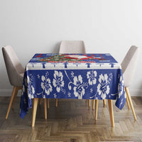 Blue Christmas tablecloth with Santa, tree, flags, snowflakes, and decorative border