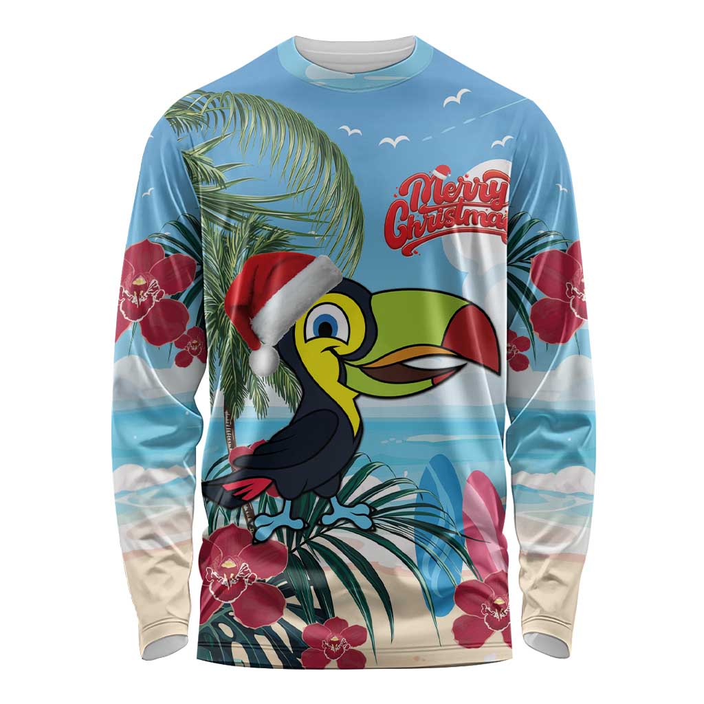 Blue long-sleeve shirt with toucan in Santa hat, palm leaves, and Merry Christmas print