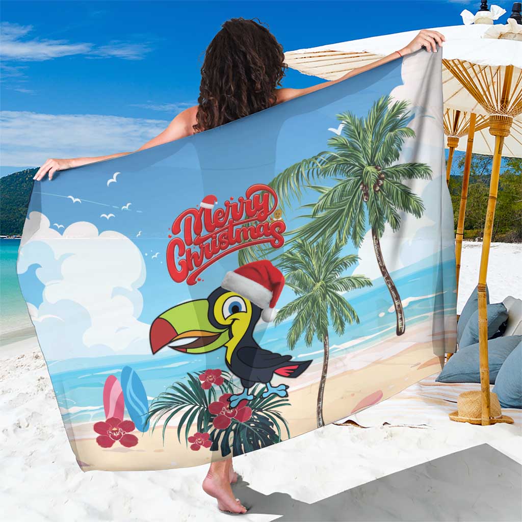 Tropical Christmas sarong with toucan, palm trees, and Merry Christmas logo