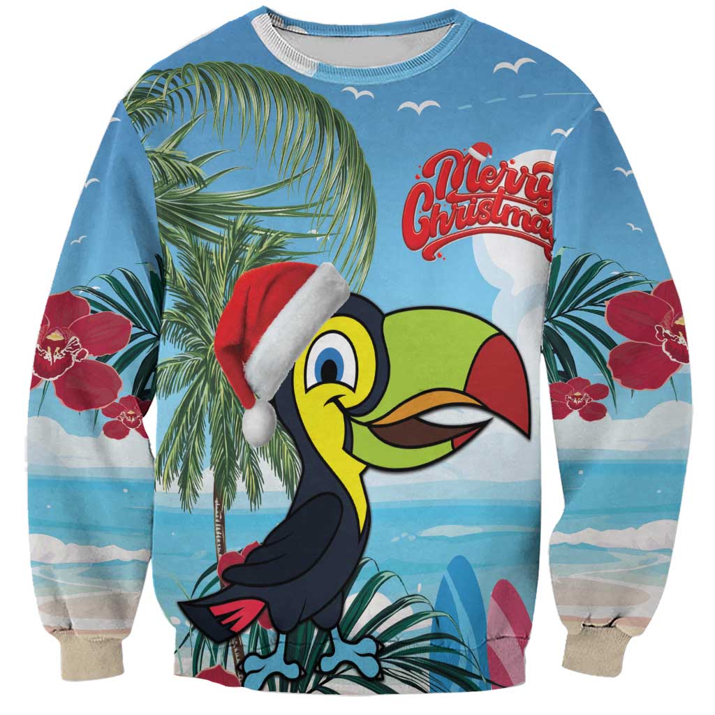 Blue unisex Christmas sweatshirt with toucan wearing Santa hat and palm tree print