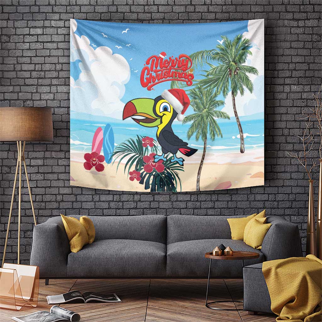 Blue Christmas tapestry with toucan wearing Santa hat, palm tree and tropical flowers