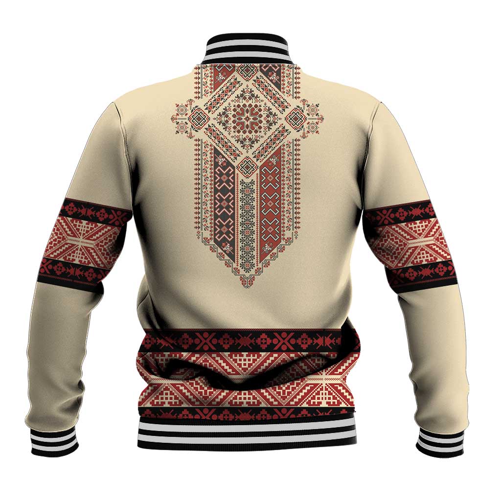 Beige baseball jacket with red traditional embroidery centered on back and striped cuffs