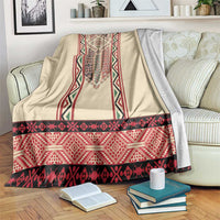 Beige blanket with red and black Romanian-style embroidery stripes and central vertical motif.