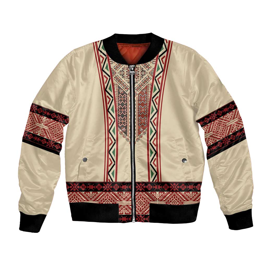 Beige bomber jacket with red traditional embroidery panels and black ribbed hem