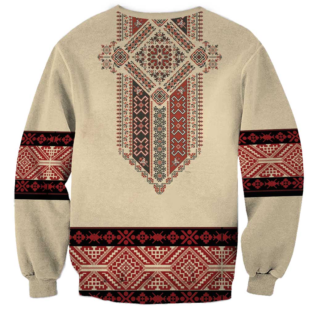 Beige unisex sweatshirt with red back embroidery panel and patterned horizontal bands
