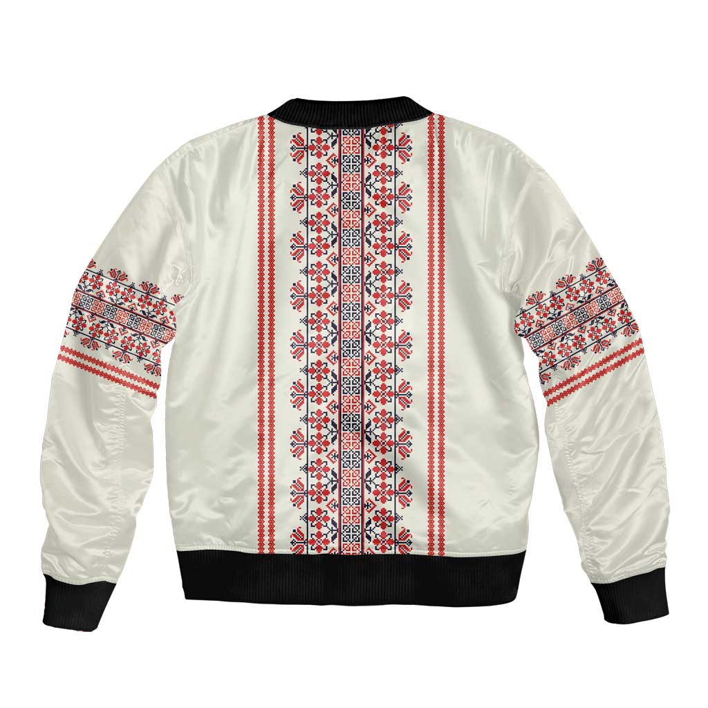 Beige bomber jacket with red/white folk pattern stripe panels, black rib hem and cuffs