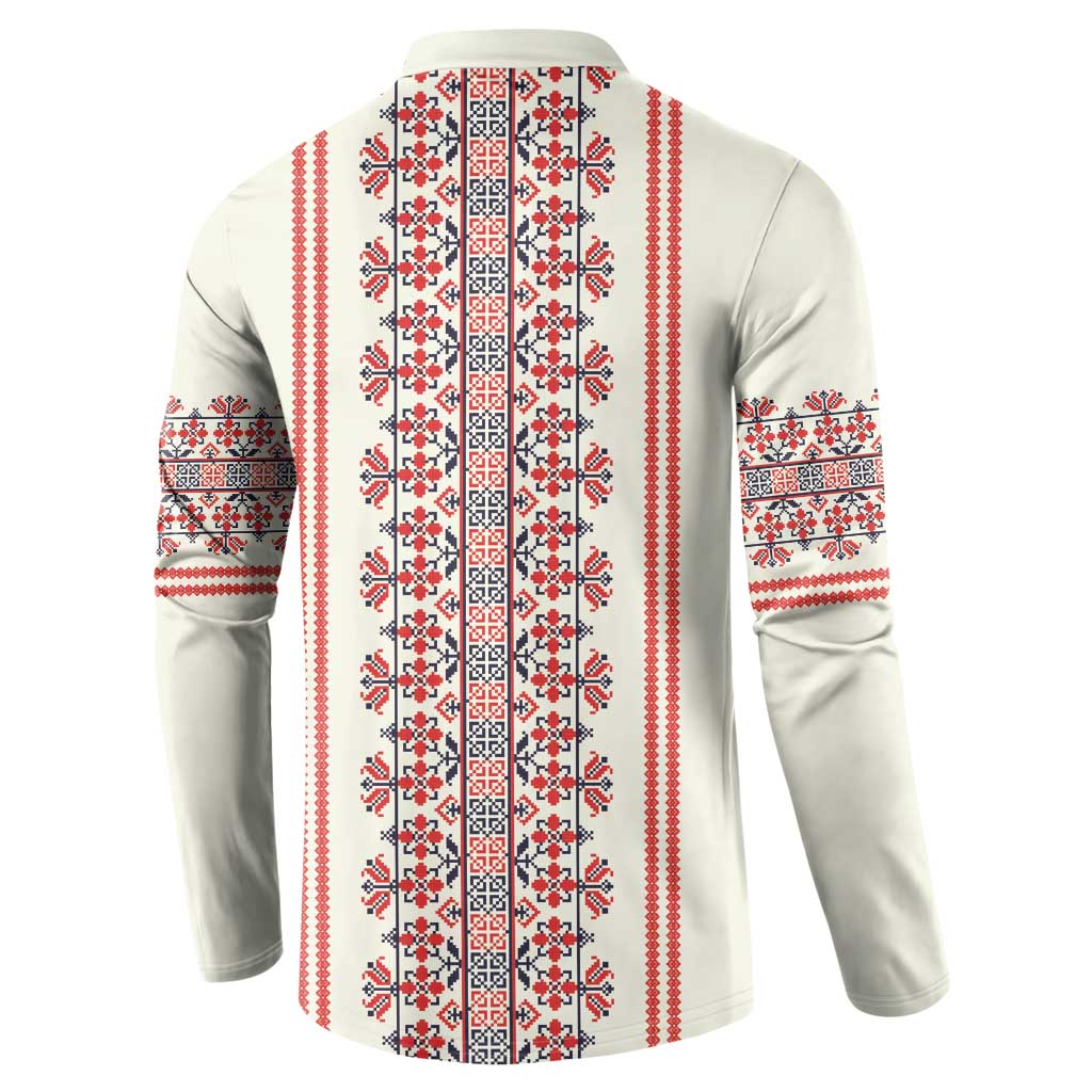 Beige long-sleeve sweatshirt back with red, white, and blue vertical folk stripe pattern and cuffs
