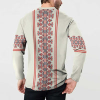 Beige long-sleeve sweatshirt back on model with red, white, and blue vertical folk stripe pattern