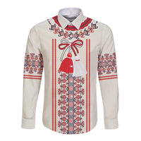 Beige long-sleeve button shirt with red, blue folk pattern and chest bow detail