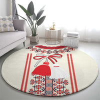 Beige round carpet featuring a costumed girl center with red, black, and white pattern