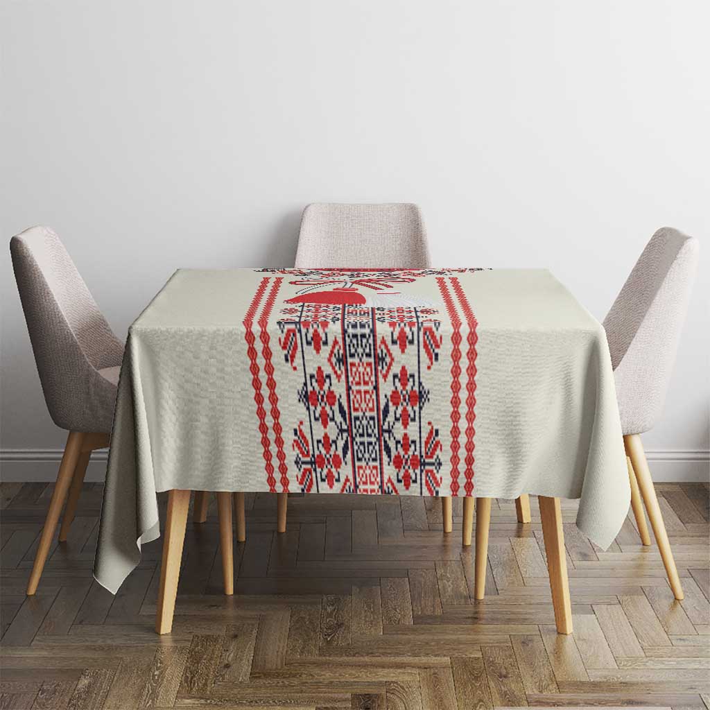 Beige rectangular tablecloth with red and white folk stripe runner center