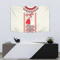Beige traditional wall tapestry featuring red dress, bow and decorative cross-stitch pattern