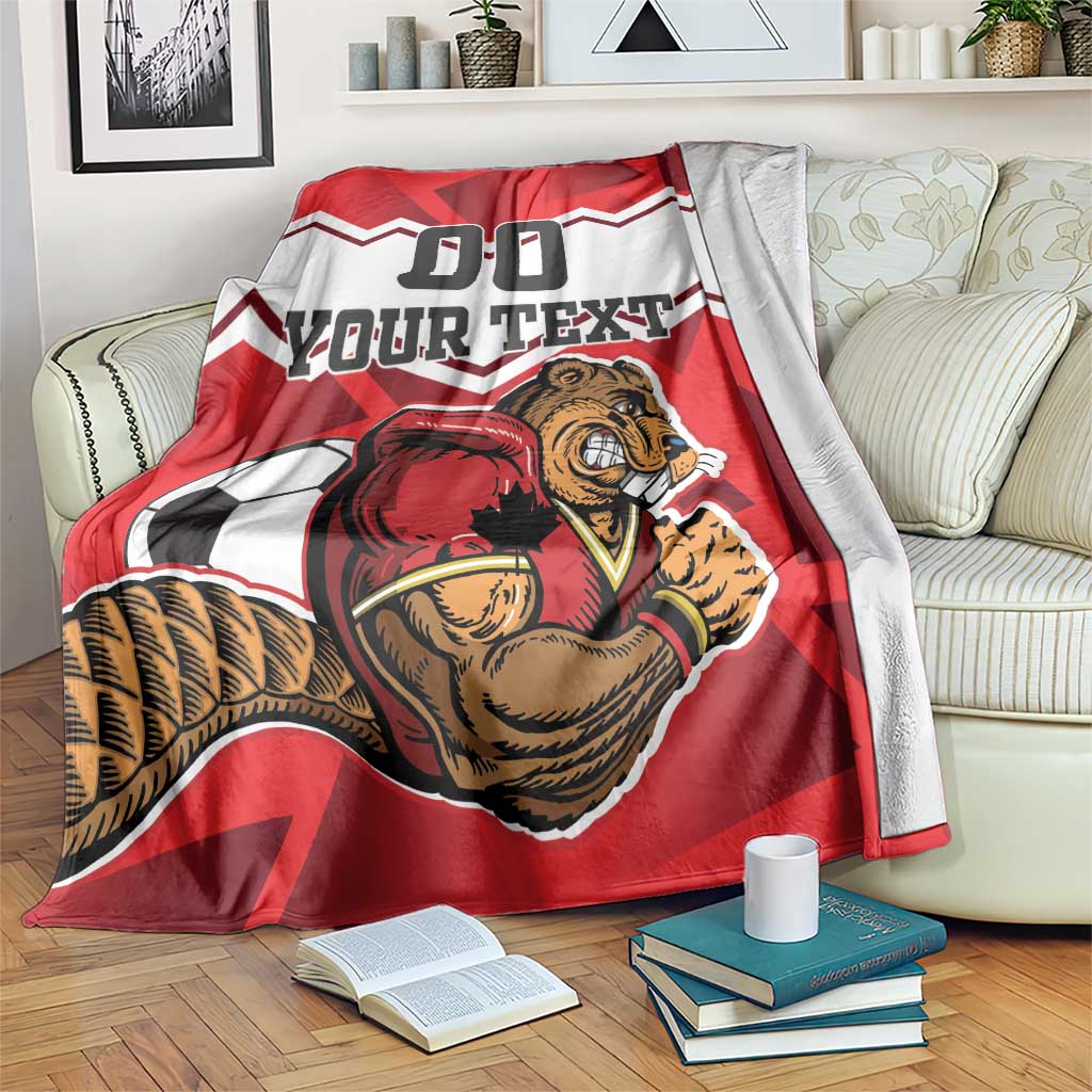 Red and white sports blanket with beavers mascot and 'YOUR TEXT' draped on couch