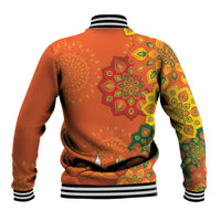 Orange baseball jacket with green-yellow rangoli pattern, striped ribbed collar and cuffs.