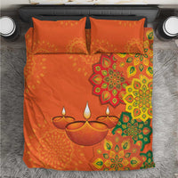 Saffron orange bedding set with rangoli-style floral medallion print and two matching pillows