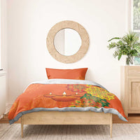 Orange bedding set with rangoli candle medallion print and two coordinating pillow shams