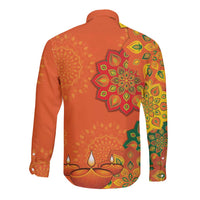 Unisex long-sleeve button shirt, orange with gold and green rangoli-style mandala back