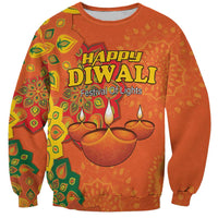 Unisex orange sweatshirt with Happy Diwali print and rangoli candle design