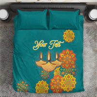Teal bedding set with “Your Text” and Diwali diya and floral mandala print