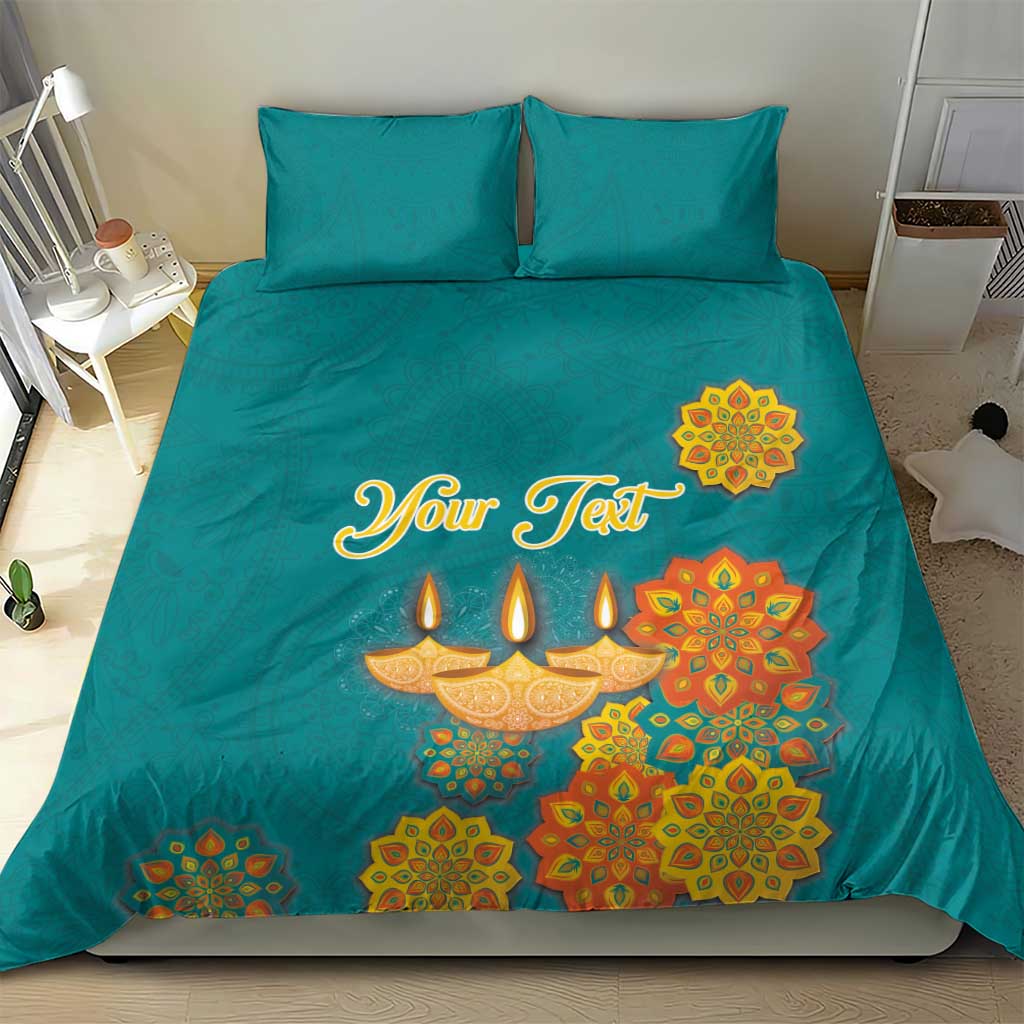 Teal bedding set with “Your Text” center design of Diwali diyas and floral mandalas