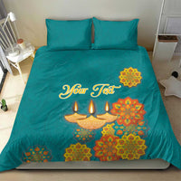 Teal bedding set with “Your Text” center design of Diwali diyas and floral mandalas