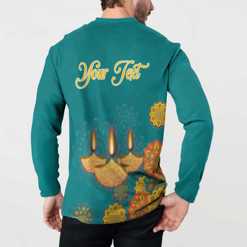Teal button sweatshirt worn from back with 'Your Text' diya candles and ornaments