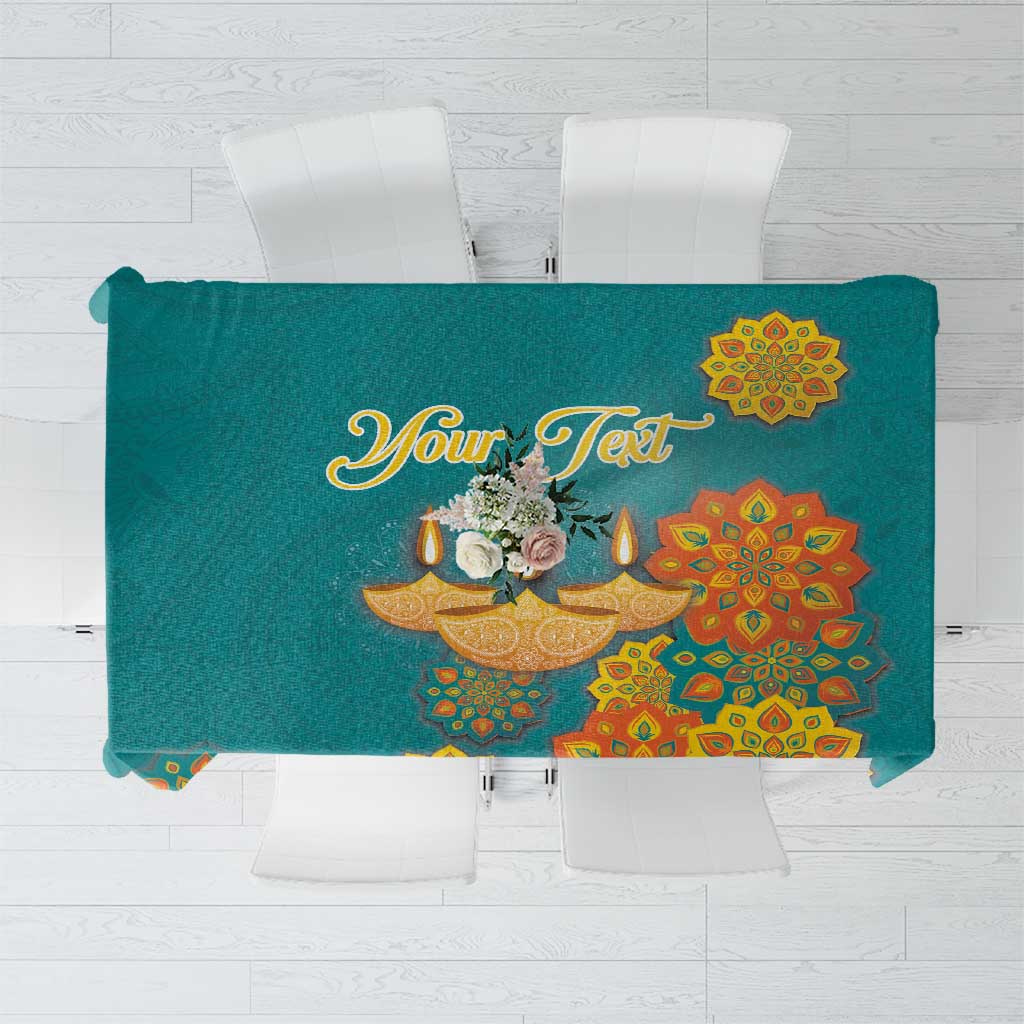Teal rectangular Diwali tablecloth with gold diya and floral mandala designs