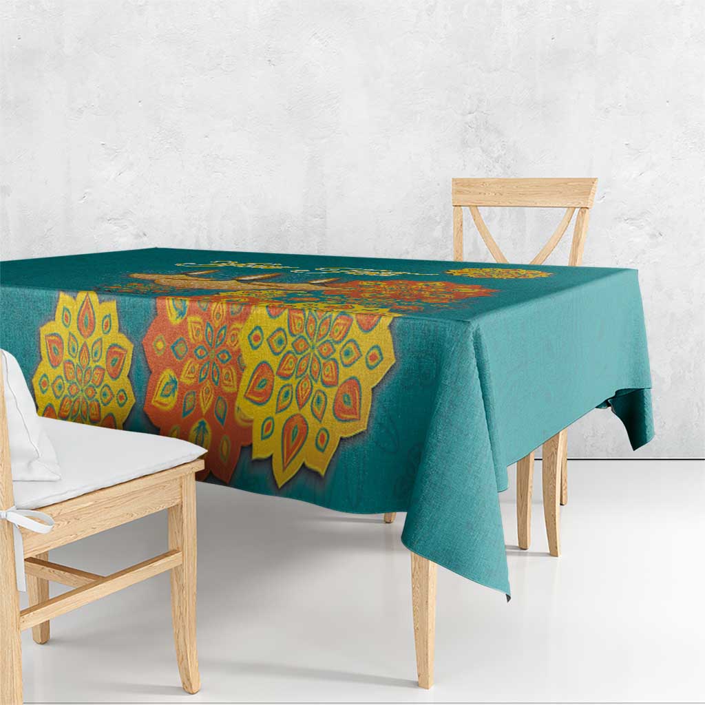 Teal festival tablecloth with yellow and orange mandala pattern and diya motifs