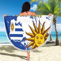Round fringed beach blanket with Uruguay flag and sun face graphic, “00 YOUR TEXT”