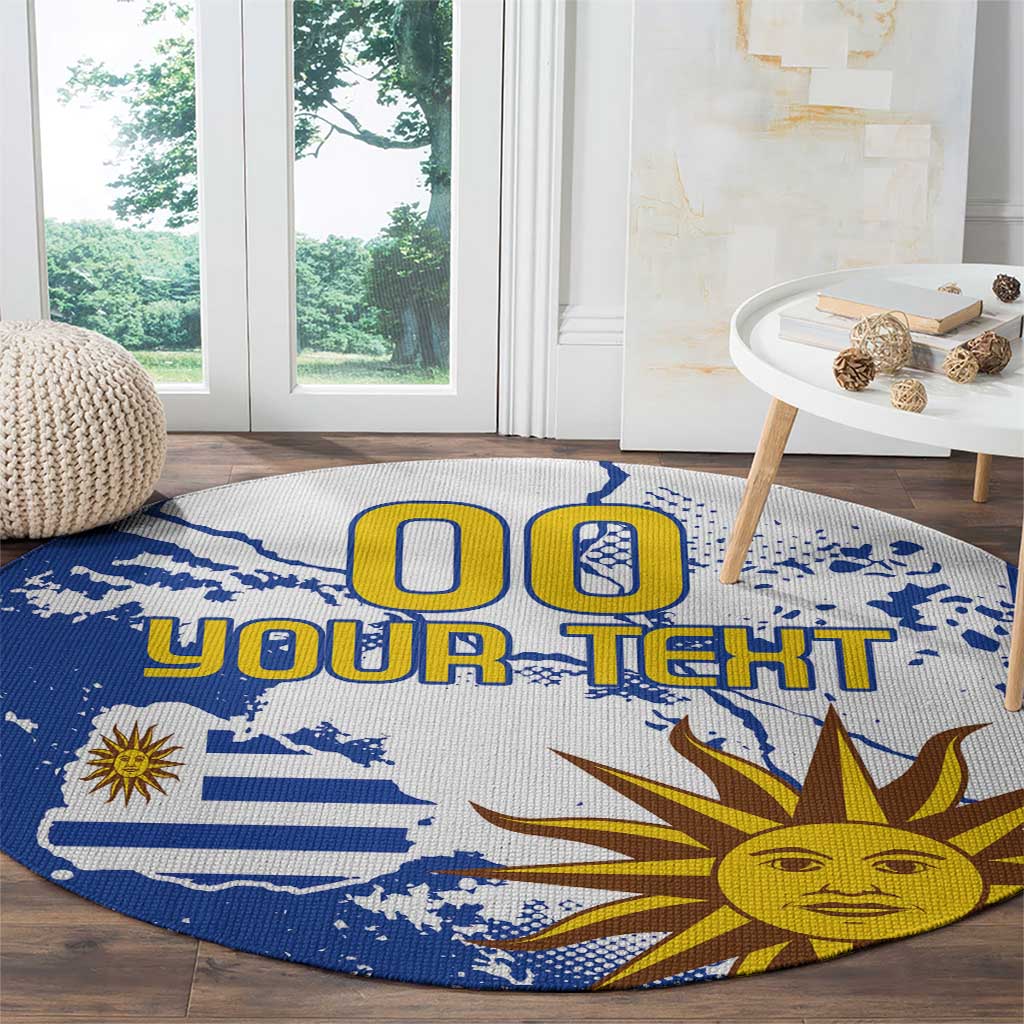 Round blue area rug with Uruguay flag and sun graphic, custom text centered