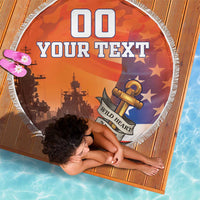 Round orange beach blanket with patriotic ship-and-anchor graphic and white fringe border